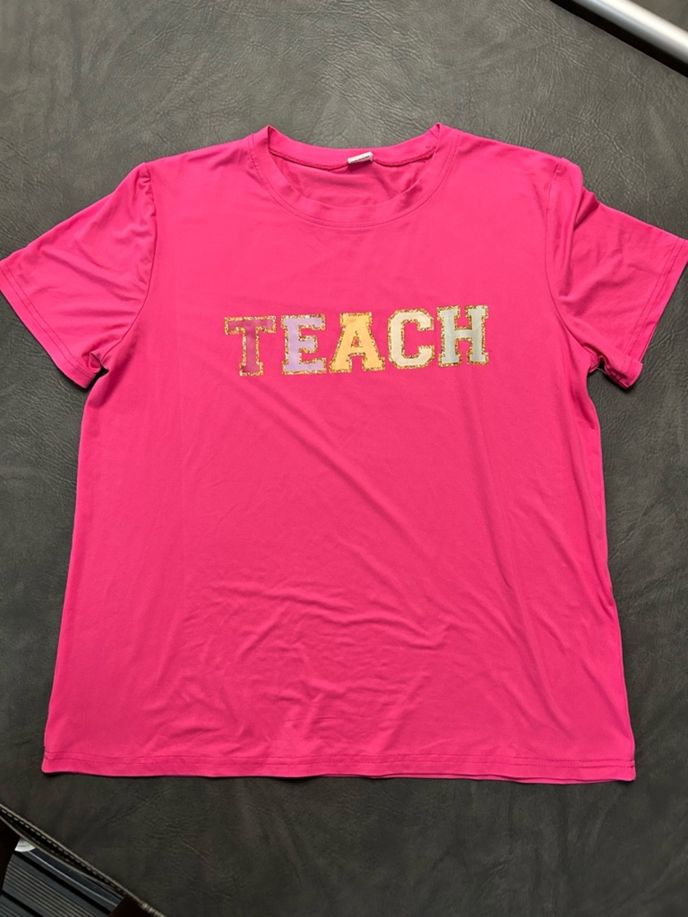 TEACH Graphic Tee - Hot Pink with colorful Lettering Large